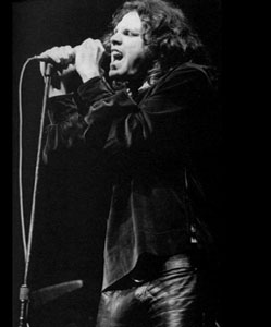 Jim Morrison in black leather pants showing everything he's got